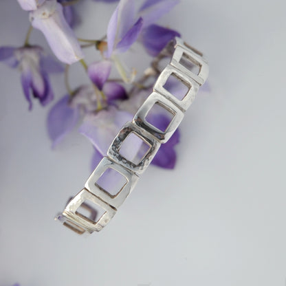 BRACCIALE QUADROTTI